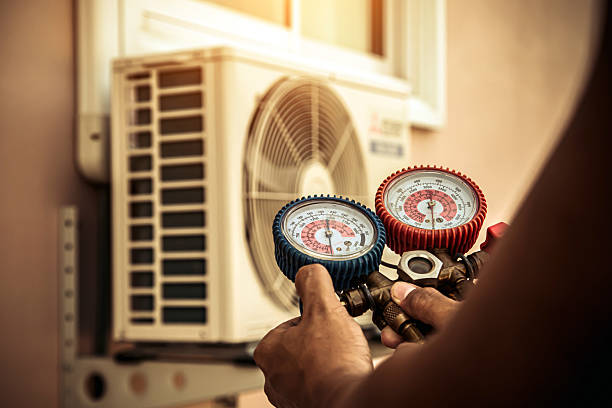 Professional Heat Pump Repair technician working in Fraser, MI